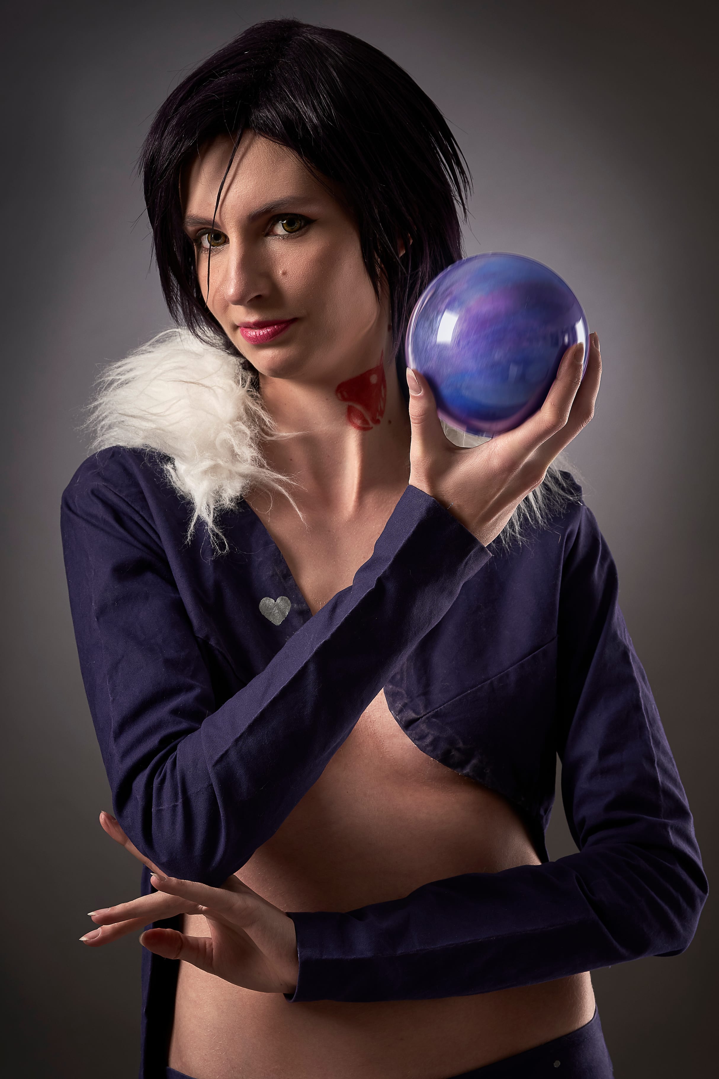 Cosplayer posing in a handcrafted character costume