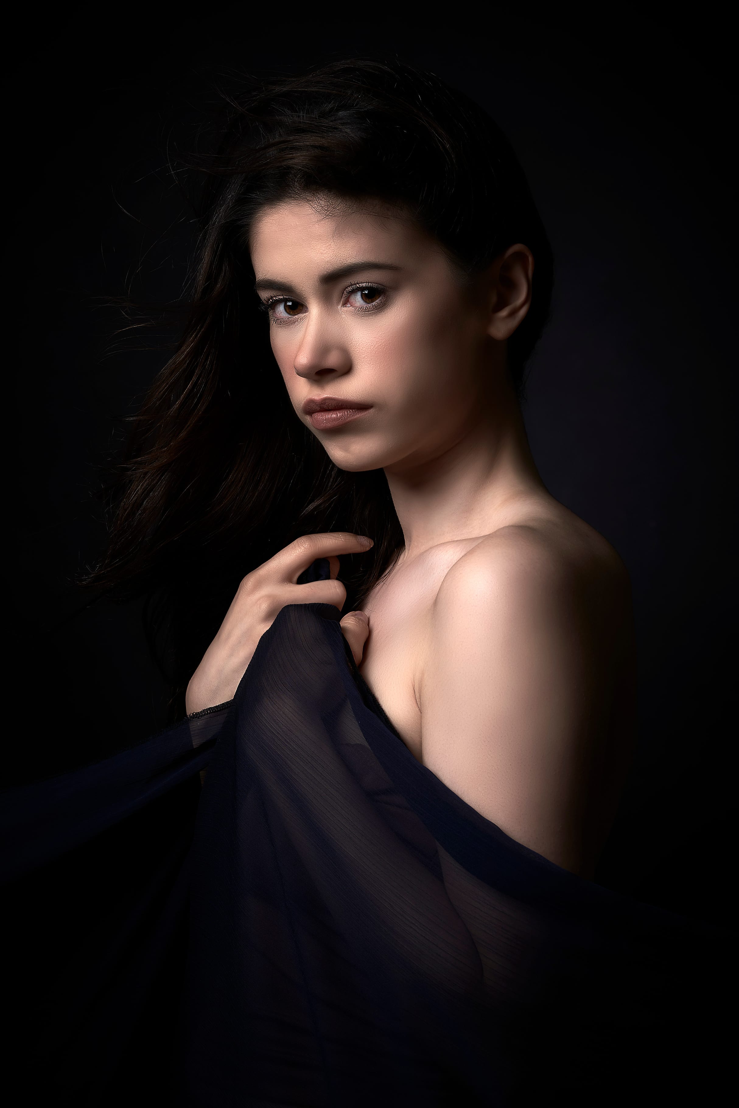 Iranian sitter in a painterly studio portrait